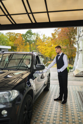 parking valet taking care customer vehicle 1